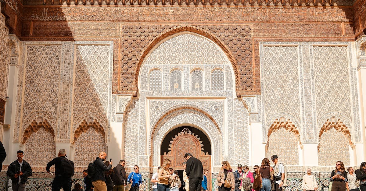 Group of tourists exploring Ben Youssef Madrasa