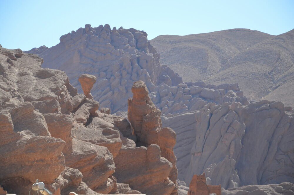 Scenic Dades Mountains in Morocco with dramatic rock formations, winding roads, and panoramic valley landscapes