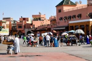 Bustling but relaxed market scene in Jemaa el-Fnaa square, Marrakesh
