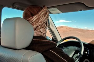 A local driver navigating the Agafay desert, Morocco