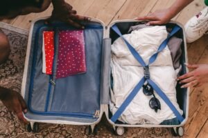 Neatly packed open suitcase with travel essentials