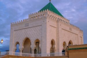Rabat Travel Guide The Mausoleum of Mohammed V beside Hassan Tower in Rabat, Morocco