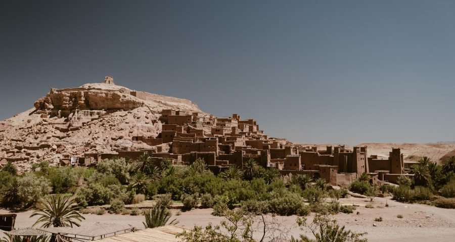 The fortified earthen ksar of Ait Ben Haddou with its pedestrian footbridge over the Asif Ounila river