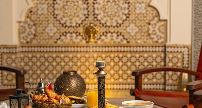 Elegant candlelit Moroccan dining table setting for a romantic dinner