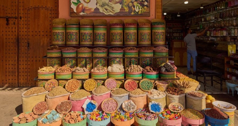 Colorful spices and goods on display at a traditional Marrakech market