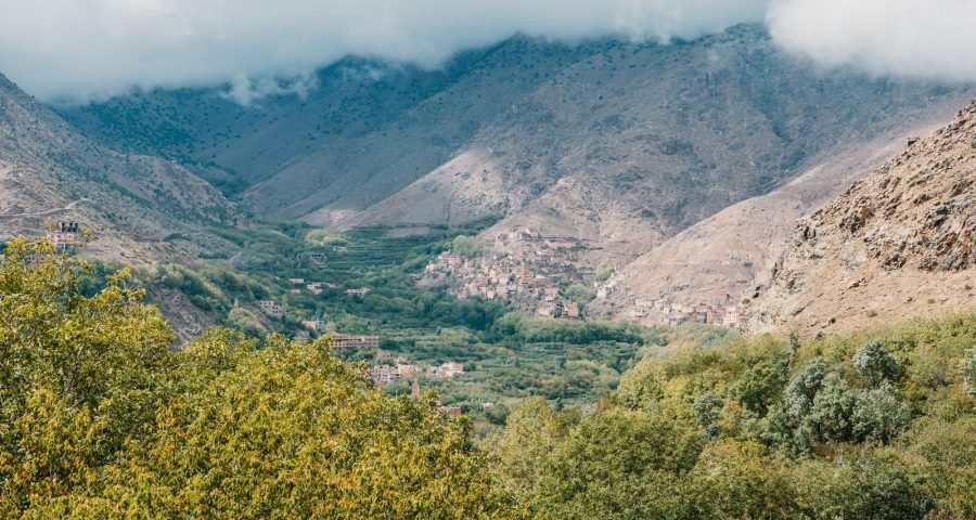 Scenic aerial view of a lush green valley in the Atlas Mountains near Marrakech