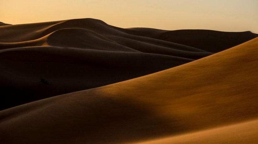 Golden Sahara dunes at sunset near Merzouga